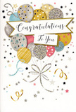 In this image, a beautifully festive congratulations card is shown, its artwork echoing the feeling of walking into a room in Queensbury just as everyone bursts into applause. A generous cluster of illustrated balloons gathers in the centre, rising in a loose arc that draws the eye upward. Each balloon is plump and round, rendered with soft highlights that give a gentle, almost satiny shine. The colour palette blends rich gold and gleaming silver with champagne beige, light blue, rosy pink and quiet grey, creating a harmonious balance of warm and cool tones. Some balloons sparkle with tiny scattered stars, others are wrapped in slender stripes or flecks of glitter, giving the impression of varied finishes while remaining delicately coordinated. From their bases, fine gold and silver strings stream down in curving lines, intertwining in a way that suggests movement and connection. Around the balloons, a scatter of small stars, floating ribbons and playful curls drifts across the pale background, reminiscent of confetti slowly settling after a toast in a home off Kenton Road. A tasteful banner crosses the middle of the card, its edges subtly defined as though slightly raised. Within, a 'Congratulations' greeting is written in expressive, elegant script that feels personal, as if carefully penned just for the recipient. The whole design feels airy and hopeful, with enough open space to let every detail breathe, much like a thoughtfully arranged bouquet. Paired with fresh flowers from a local Queensbury florist, this card would be an ideal companion for celebrating exam passes, job offers, promotions or any proud moment that deserves to be remembered and cherished.